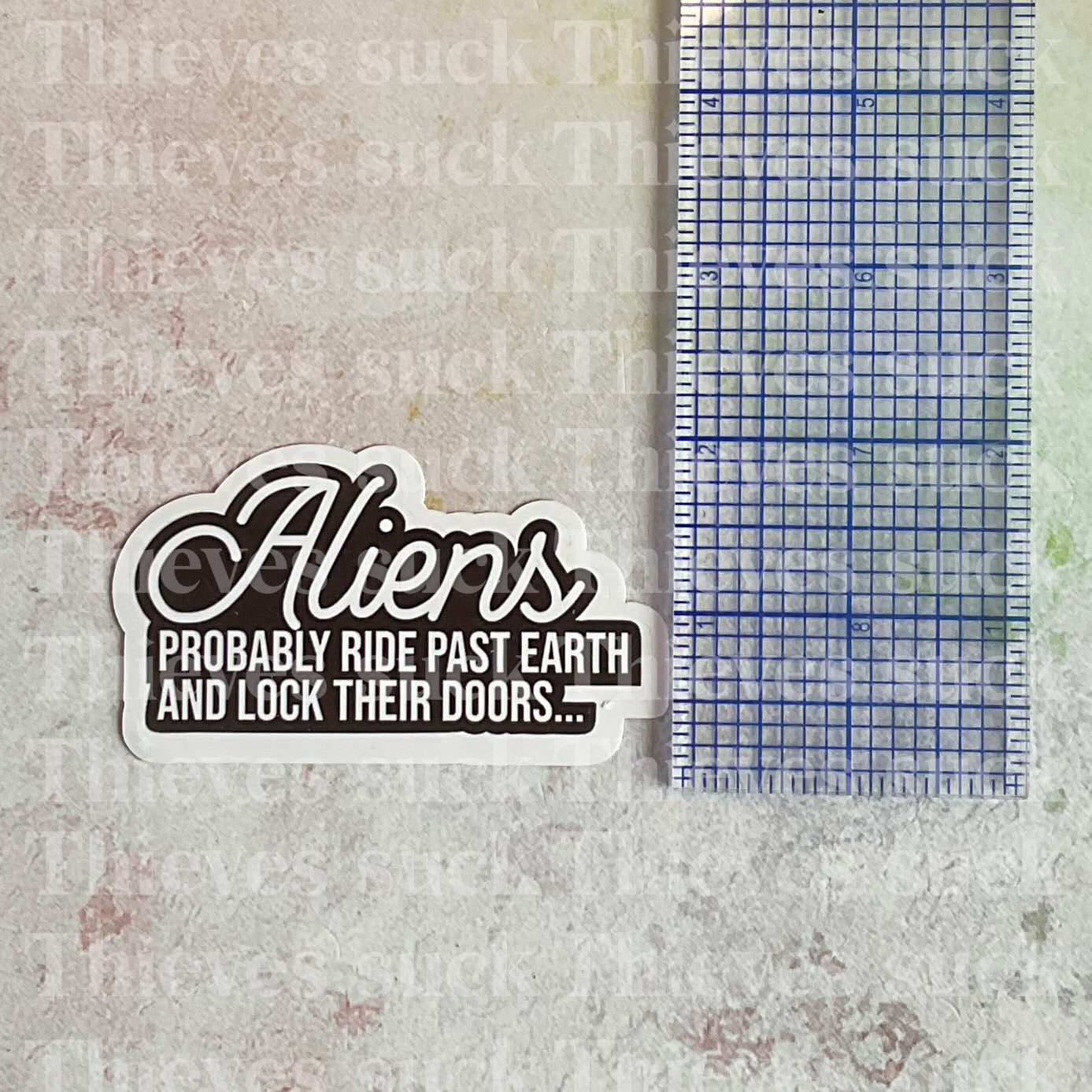 Aliens Don't Like Us Vinyl Sticker