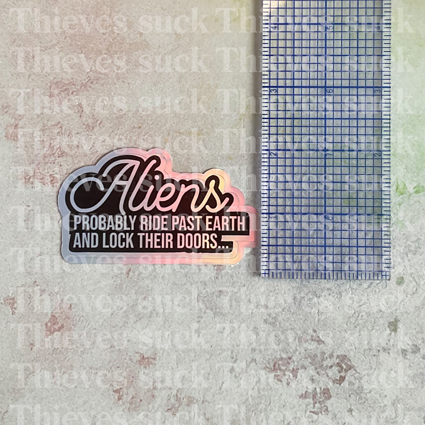 Aliens Don't Like Us Vinyl Sticker